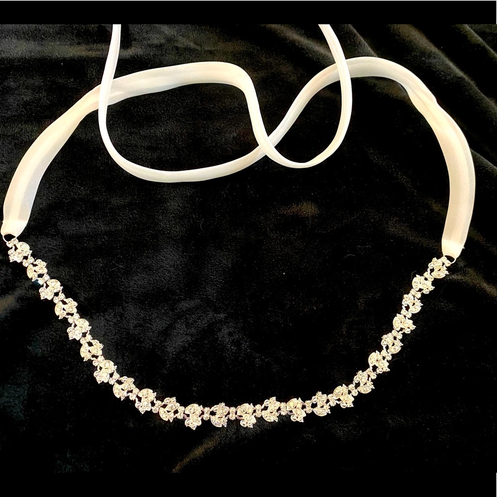 Attention Brides!!!!Like new rhinestone tie on for formal wear or wedding gown.